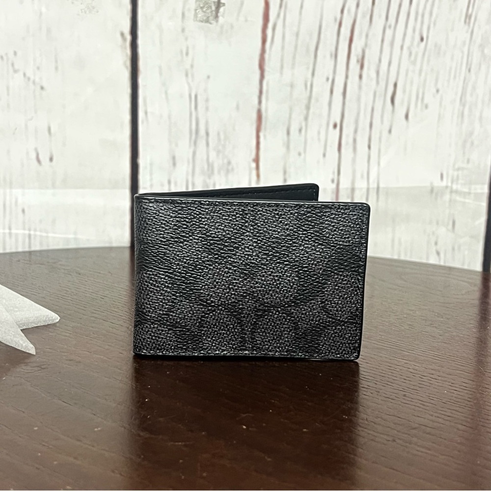 Coach Compact Billfold Wallet
In Signature Canvas charcoal/black